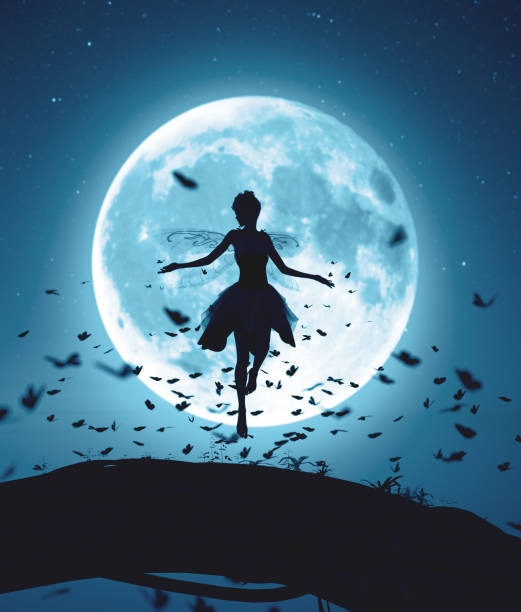 Fairy flying in a magical night stock photo