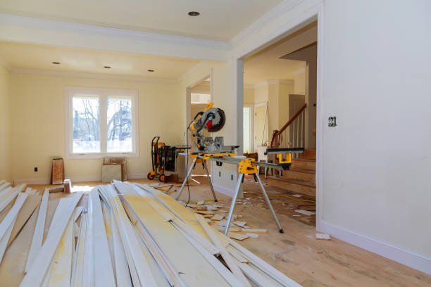 istock Construction remodeling home cutting wooden trim board on with circular saw. 1135653559