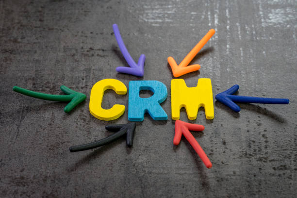 istock CRM, customer relationship management concept, multi color arrows pointing to the word SSL at the center of black cement chalkboard wall, strategies use to analyze customer interactions and data 1135655681