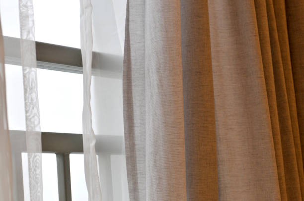 istock Curtain in sunrise background 1135655763