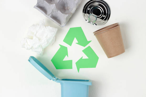 istock Green recycle garbage symbol and plastic, iron garbage on white background, top view. 1135658491