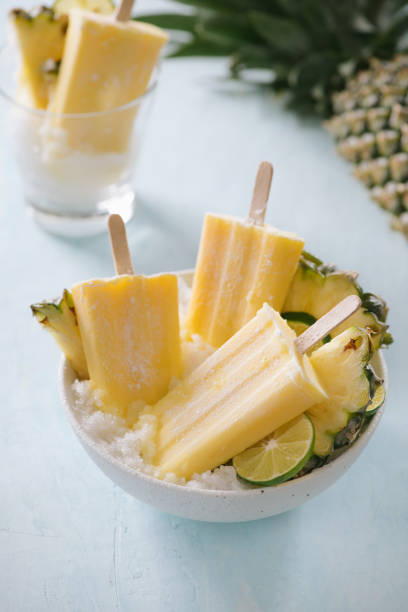 istock Homemade Pineapple Popsicles on a bowl(selective focus; close-up shot) 1135667313