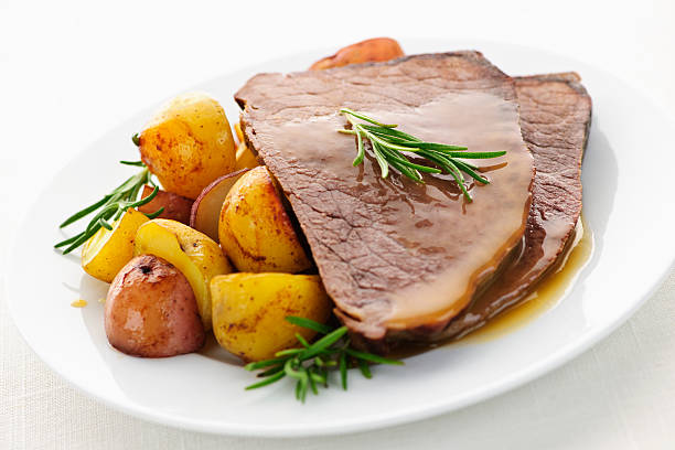 istock Plate of roast beef, potatoes, garnished 113566732