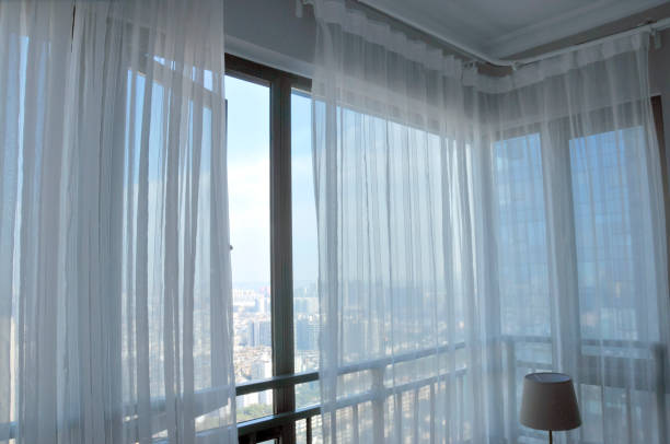 istock Curtain in sunrise background 1135667346