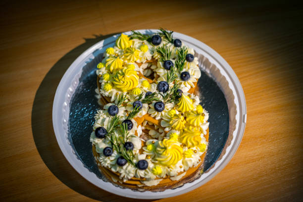 istock Light and fresh cake. Refined dessert made from meringue topped with low-fat whipped cream, mint leaves and strawberries 1135670854