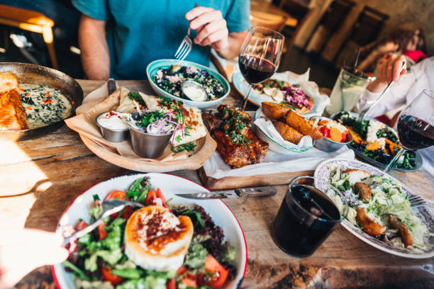 istock Enjoying lunch with friends 1135672250