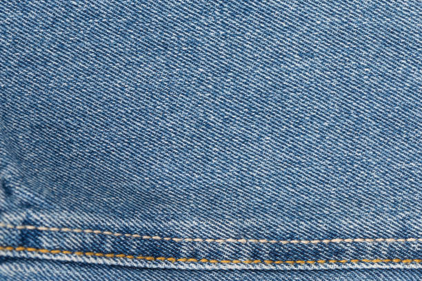 istock denim jeans background. Jeans texture fabric 1135674653