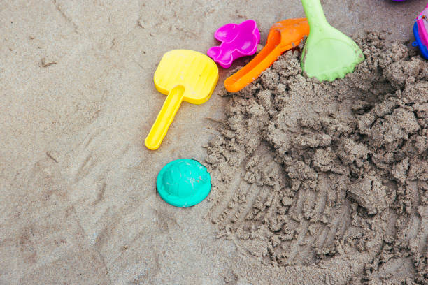 istock toys on tropical sand beach 1135677303