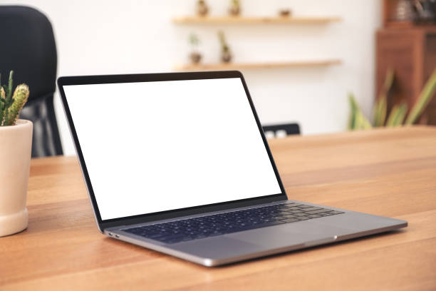 istock Mockup image of laptop with blank white desktop screen 1135679326