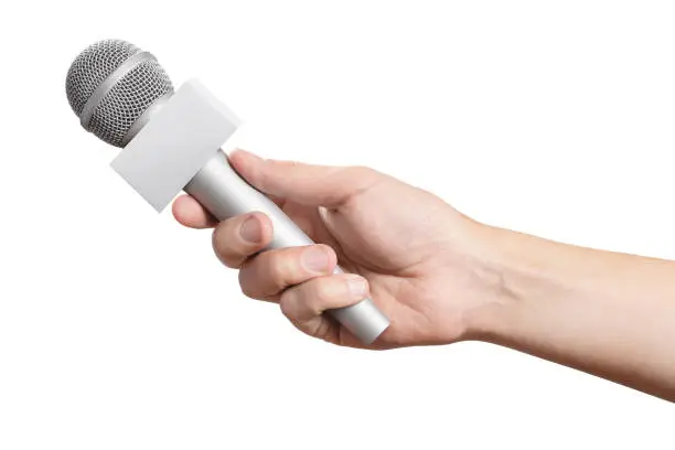 Photo of Hand with a microphone