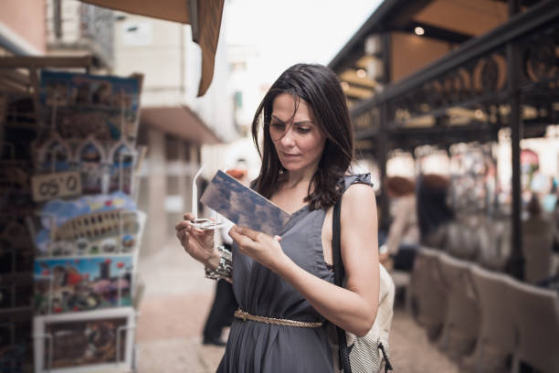 istock Young woman exploring Verona, Italy 1135687319