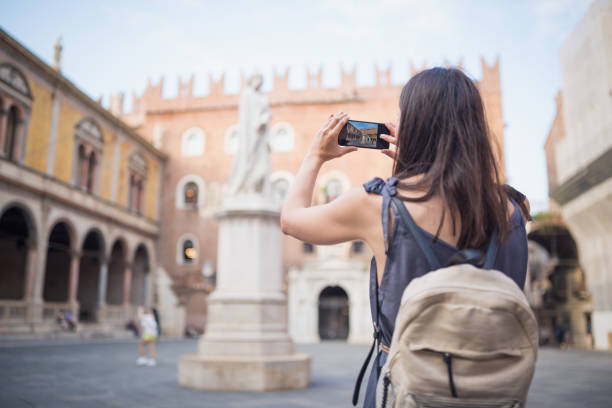 istock Young woman exploring Verona, Italy 1135687597