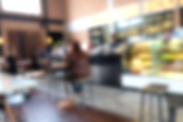 istock Blur coffee shop - cafe blurred with bokeh background, vintage style 1135688810