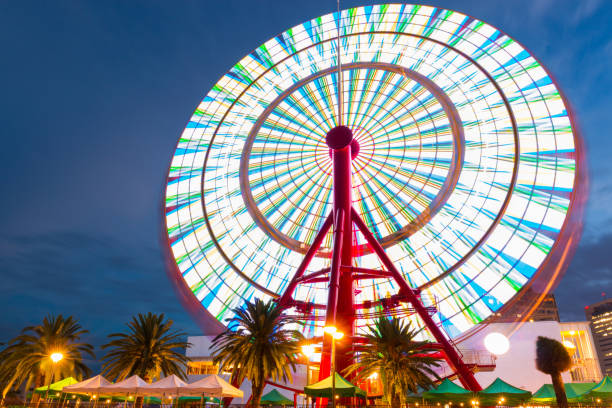 istock Beautiful Ferris Wheel Spinning Long Exposure Neons. 1135693200