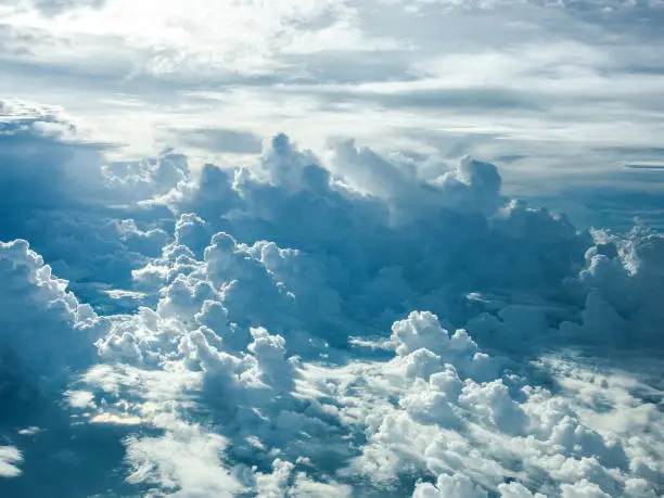 Beautiful view of a clouds taken from a window seat on a plane, Thailand