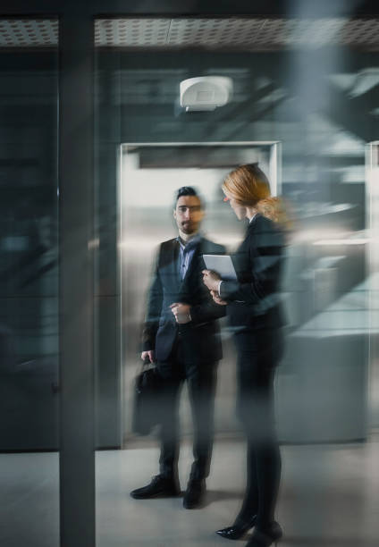 istock Business People Discussing in The Lobby 1135693681