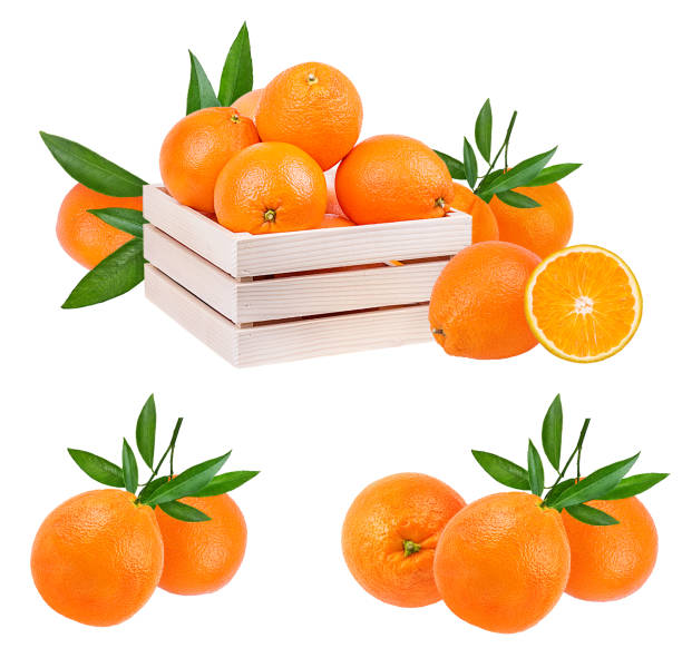 istock Oranges in a wooden box isolated on white background with clipping path 1135699240
