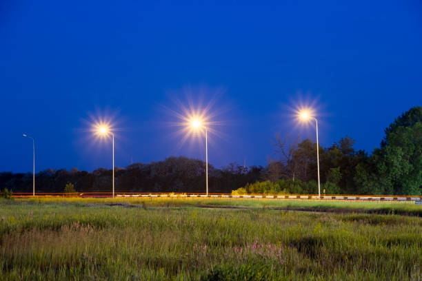 istock Lights near highway. Night scene. 1135701954