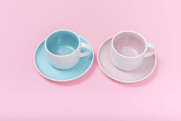 istock Clean dishes, coffee or tea set on pink background. top view and flat lay 1135703203