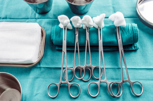istock Scissors surgical with torundas in an operating theater, composition horizontal, conceptual image 1135707723