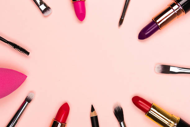 istock Beauty products frame on pink background 1135709934