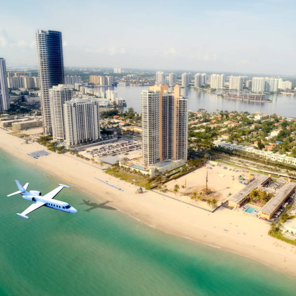 istock Airplane flying over Miami Beach, Florida, USA. 1135711193