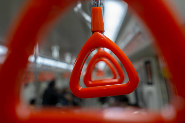 istock hanging handles in subway car 1135711249