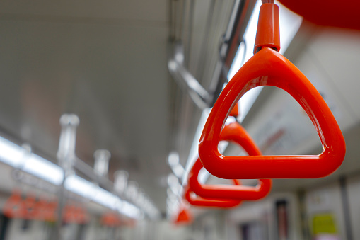 hanging handles in subway car