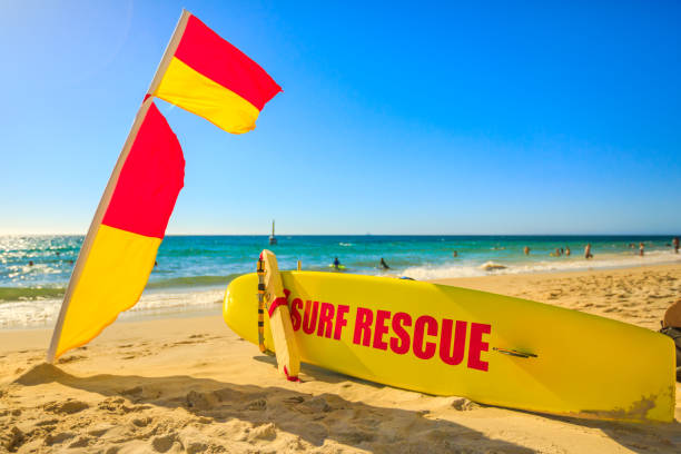Surf rescue at Cottesloe Beach Perth, Western Australia - Jan 2, 2018: Surf Rescue at Cottesloe Beach in Western Australia the Perth's most famous town beach in Indian Ocean. Popular summer holidays destination in Australia. Outdoors activity. cottesloe stock pictures, royalty-free photos & images