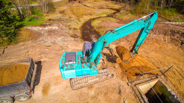 istock The backhoe digging the soil in the forest 1135715336