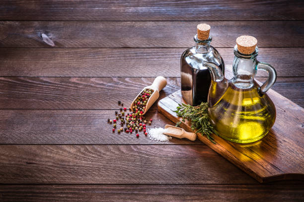 istock Olive oil and balsamic vinegar on rustic wooden table 1135717718
