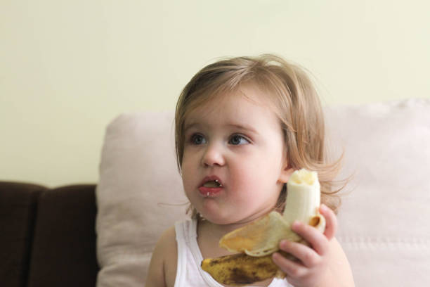 istock Mommy I don't like banana. 1135727261