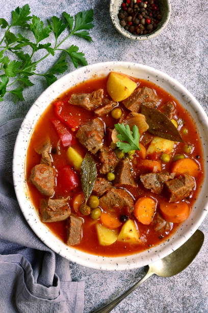 istock Meat stew with vegetables in tomato sauce 1135727431