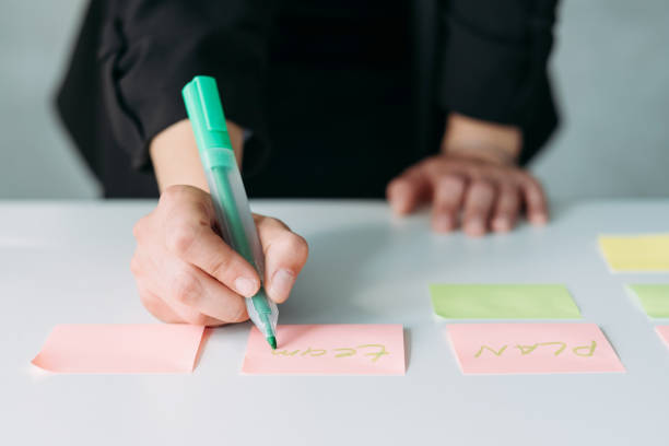 istock teamlead woman workplace brainstorming strategy 1135730105