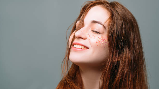 istock young woman relaxation inspiration smiling dreamy 1135730156
