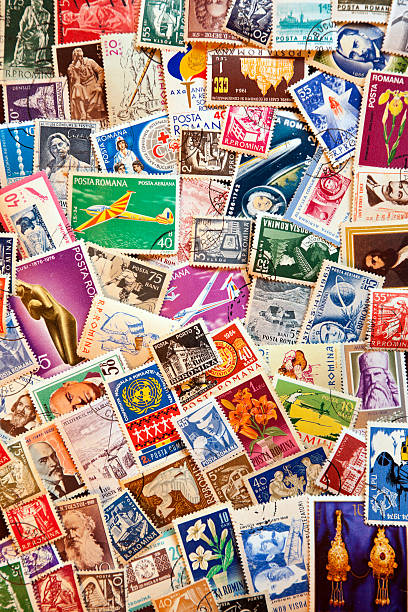 istock Pile of used post stamps from Romania 113573392