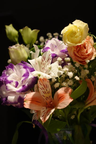 istock Beautiful wedding bouquet composed of different flowers on a black background. 1135736259