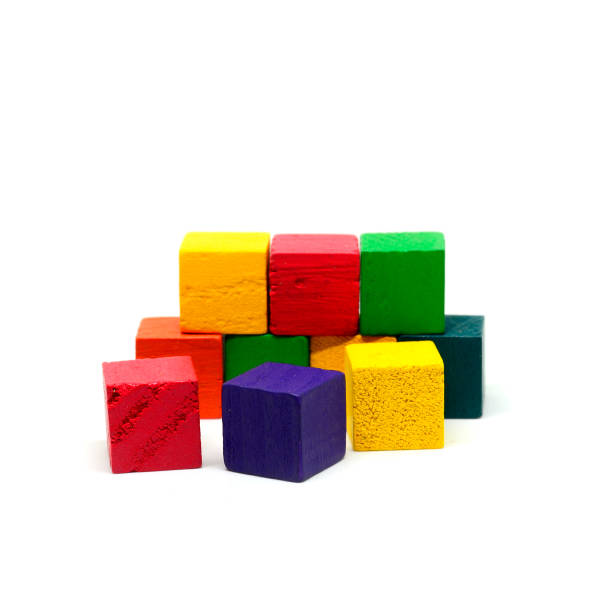 istock Close-Up Of Multi Colored Toy Against White Background 1135742601