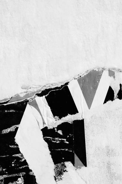 istock Blank white black old ripped torn paper crumpled creased posters grunge textures backdrop backgrounds placard 1135744643