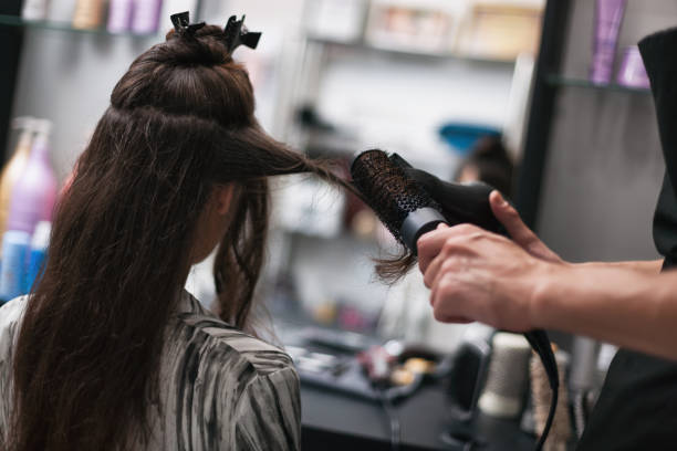 istock Hairdresser working in his studio 1135746832