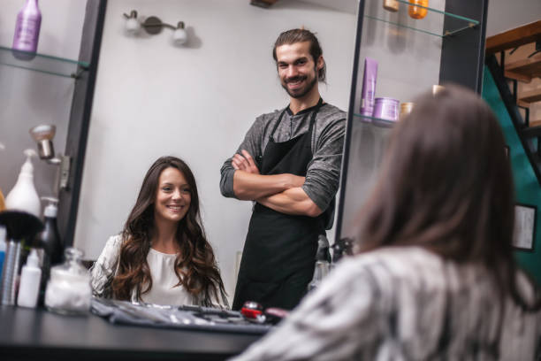 istock Hairdresser working in his studio 1135748280