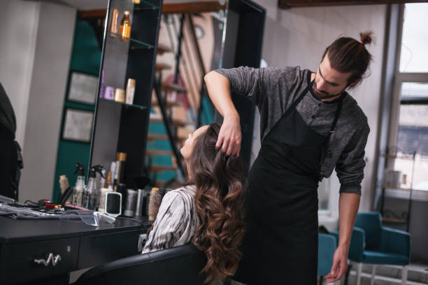 Hairdresser working in his studio