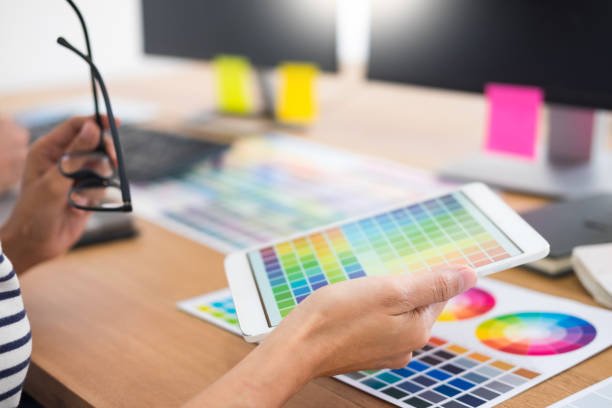 istock Midsection Of Design Professional Working On Desk 1135754186