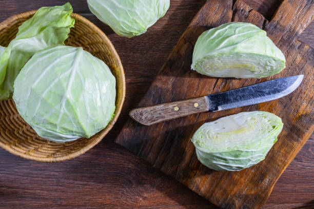 istock Prepare the cabbage to cook on the kitchen table. 1135755667