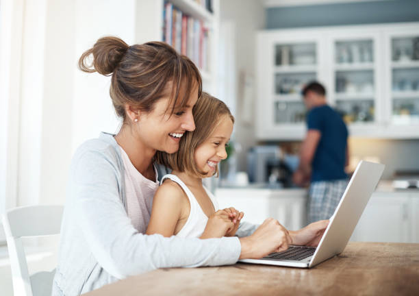 istock Looking for some mommy and daughter outfits online 1135757215