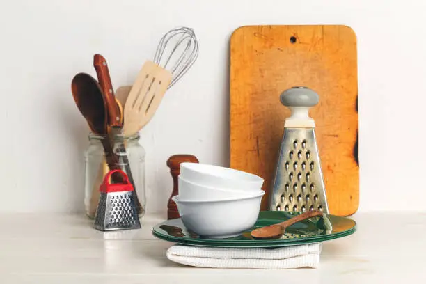 Utensils on a white table and a white background