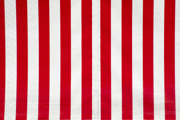 Close up of red and white striped canvas. stock photo