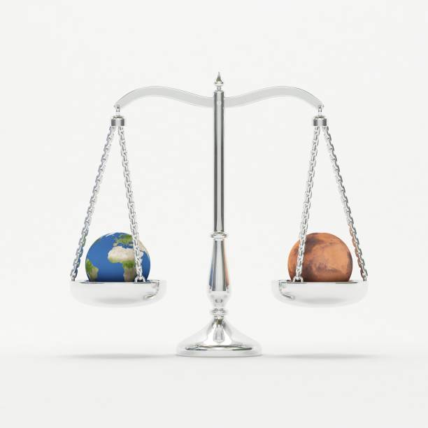 istock Earth and Mars Scales Balance - 3D Rendering 1135762111