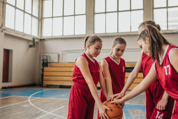 istock Female School Basketball Team 1135765101