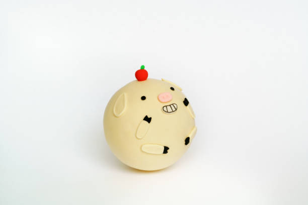 colored plasticine pig - piggy bank savings coin bank investment imagens e fotografias de stock